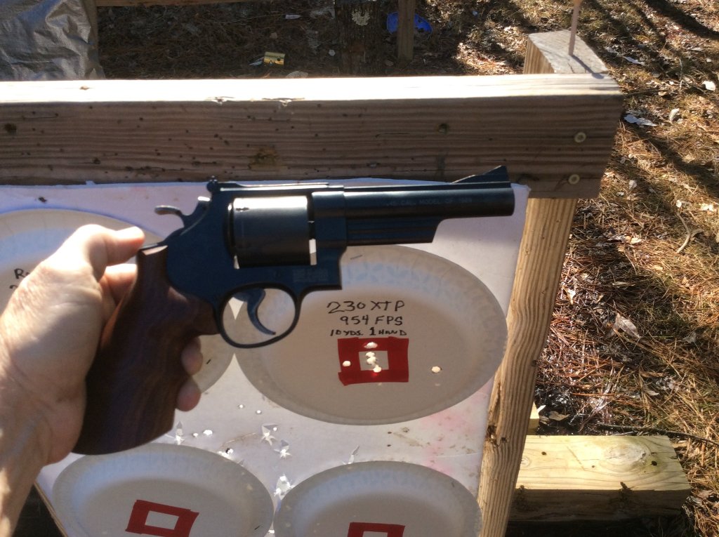 SW M25  showing shot group with 230 XTP load   a keeper for sure.jpg