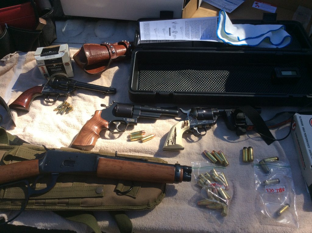 .45 revolvers and one .22 12 shooter.jpg