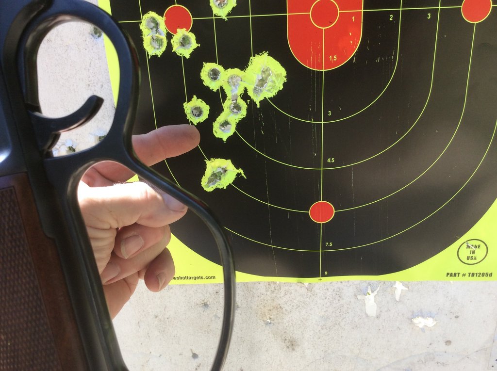 henry 44  2nd group of 7 shots 240 MB cast bullet with 9 gr. unique  2 key holes..jpg