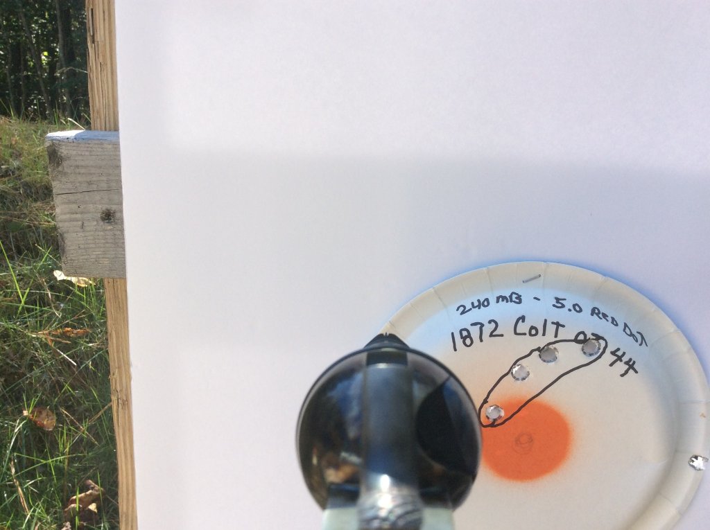 First 5 shots with them tiny tiny sights.  10 yds one hand.jpg