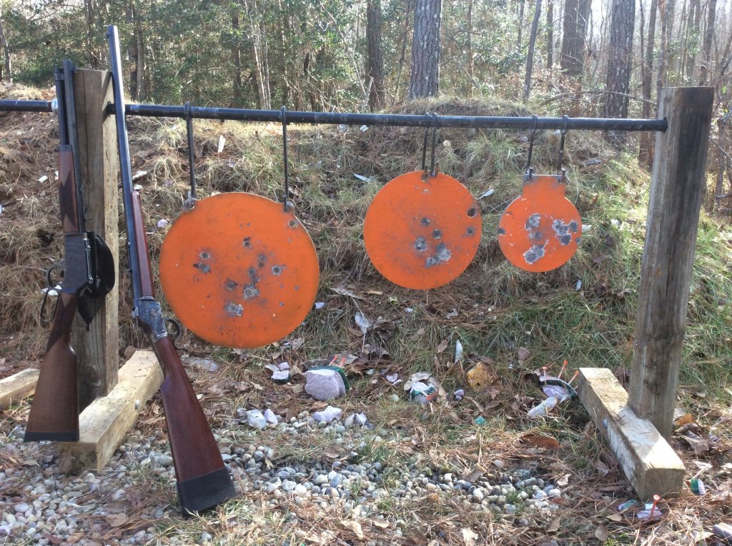 shootin steel with Henry 45 carbine and High Wall 45-70.jpg