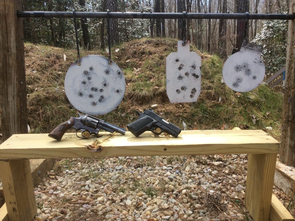 working the plates with a .357 and 45.jpg
