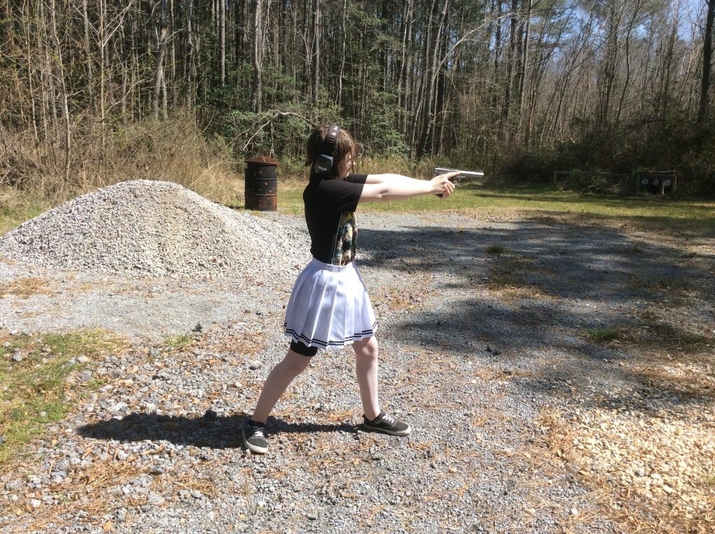Macie ready to shoot the SW Victory 22.jpg