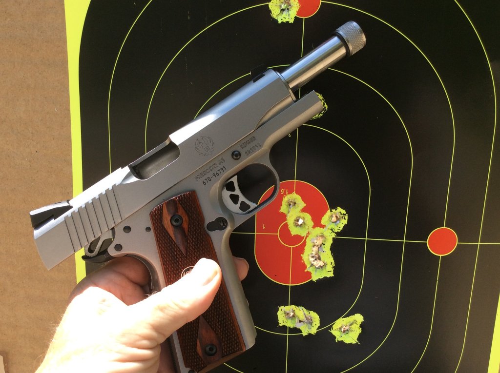 ruger 1911 with new nighthawk threaded barrel  8 yds..jpg