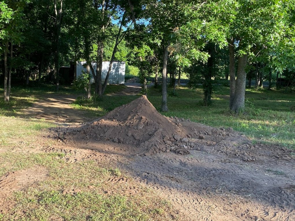 nice dent in the dump load.jpg