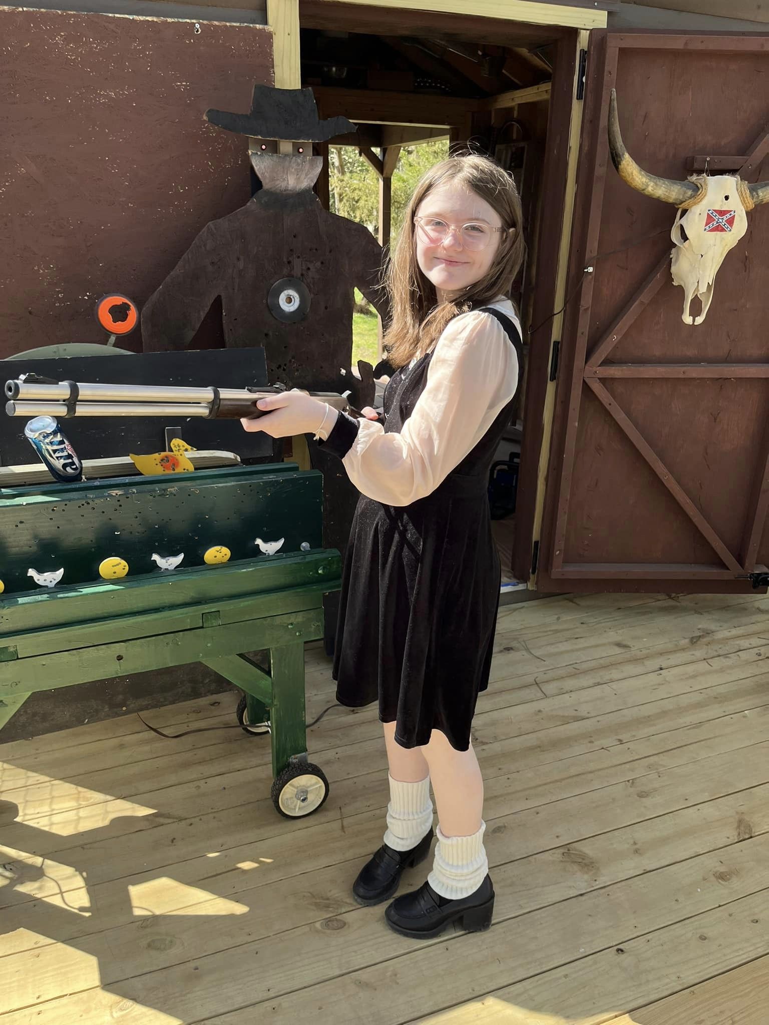happy girl at the air rifle arcade my birthday 69th.jpg