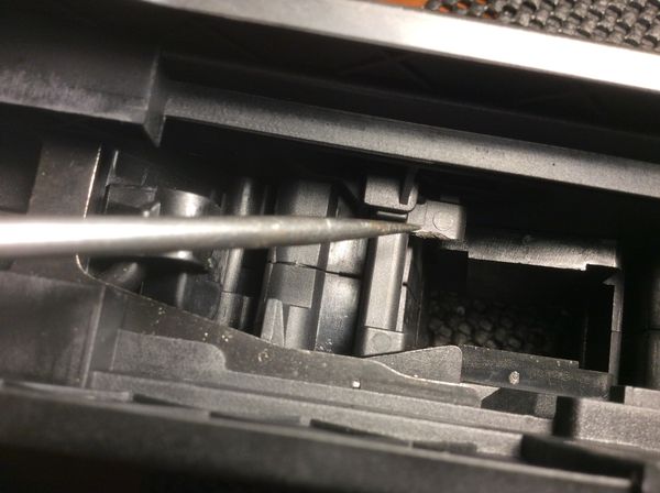 plastic polymer magazine catch in bullpup stock    not good.jpg
