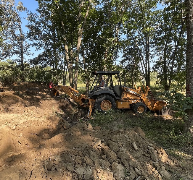 Backfilling the stump hole.jpg