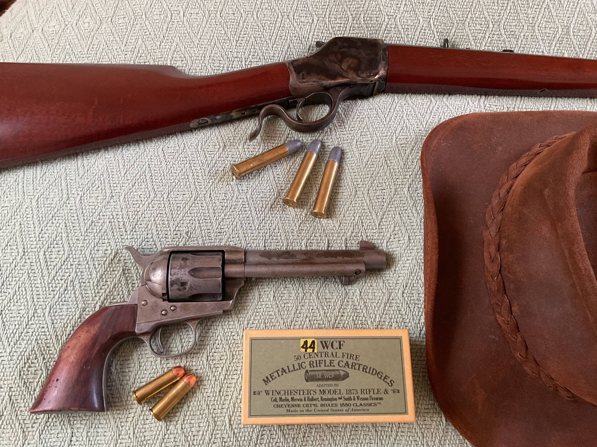 1885 Winchester High Wall .45-70 long range shooter  and old Colt 44-40  6 shooter.jpg