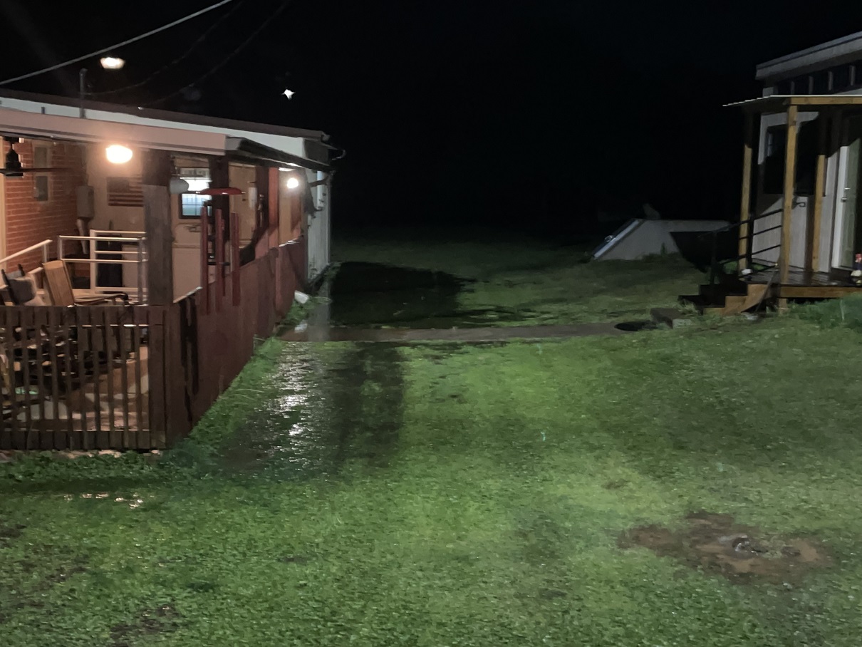 back yard flooding just after shelter.jpeg