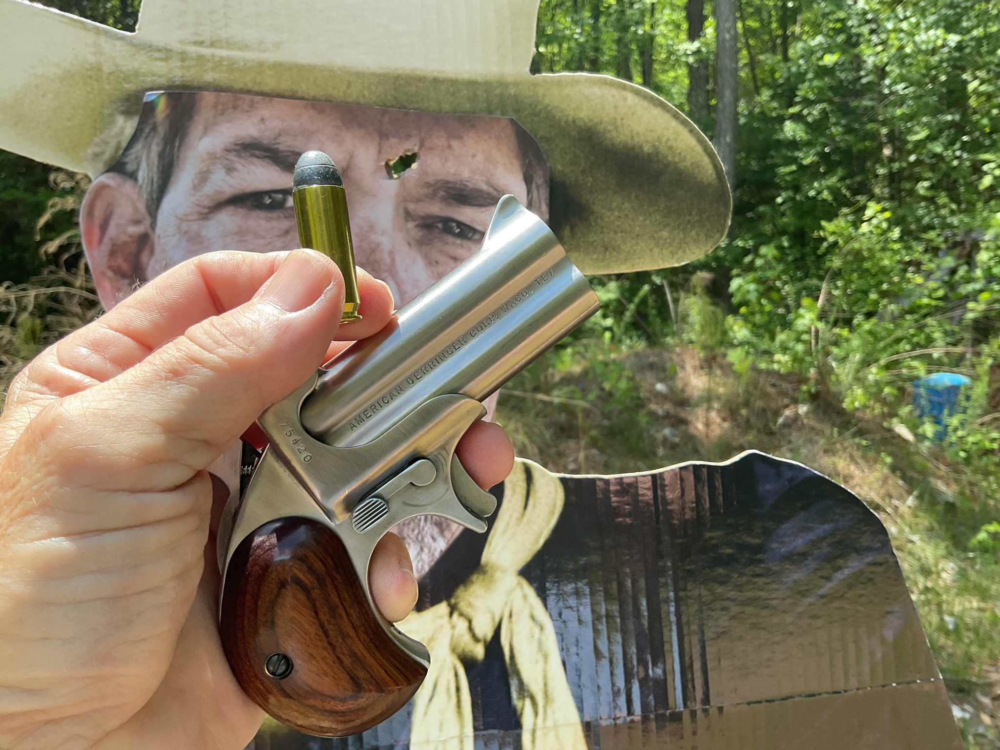 head shot with the 45 win mag derringer.jpg