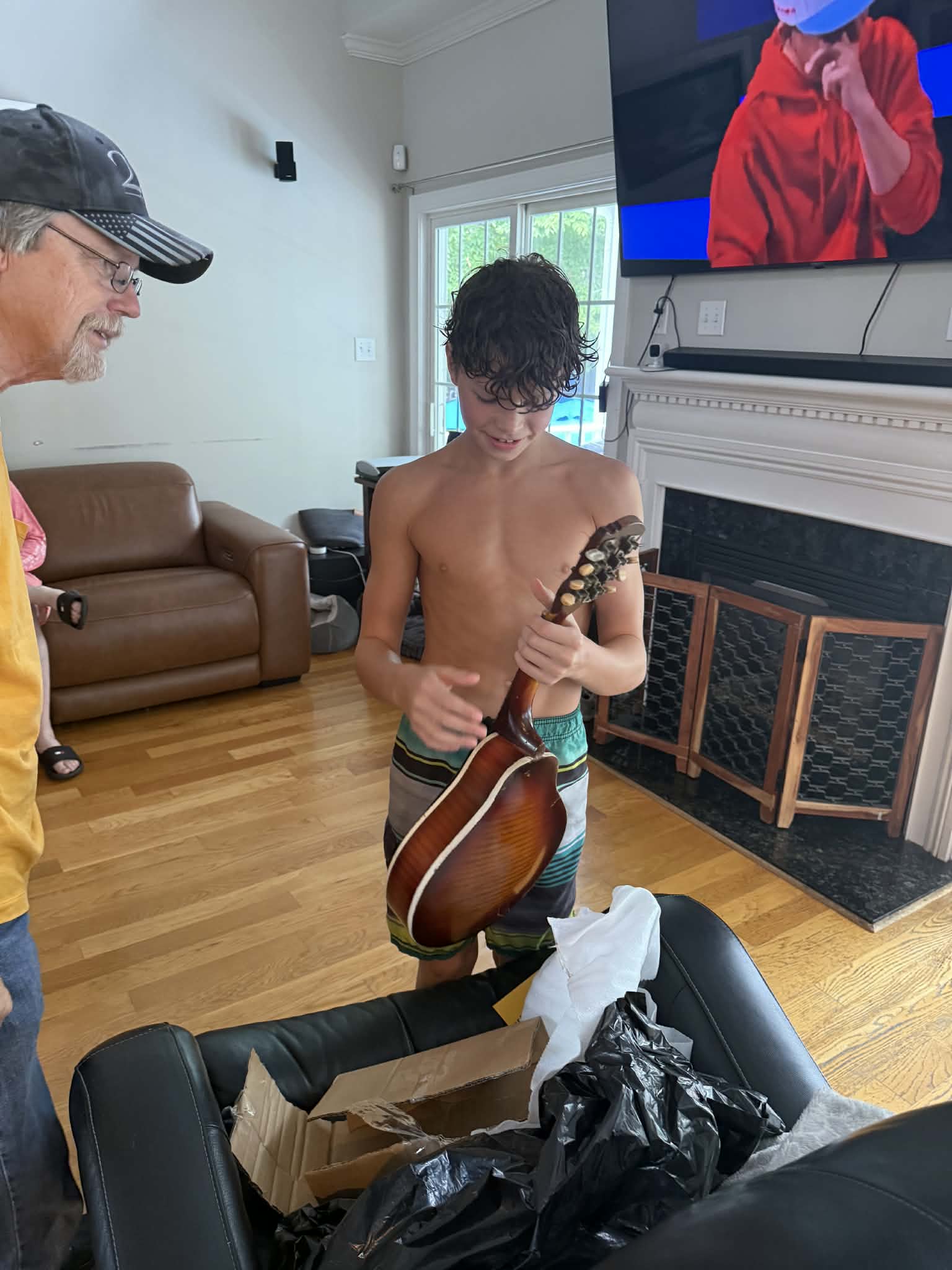 passing on THE mandolin to a younger generation.jpg