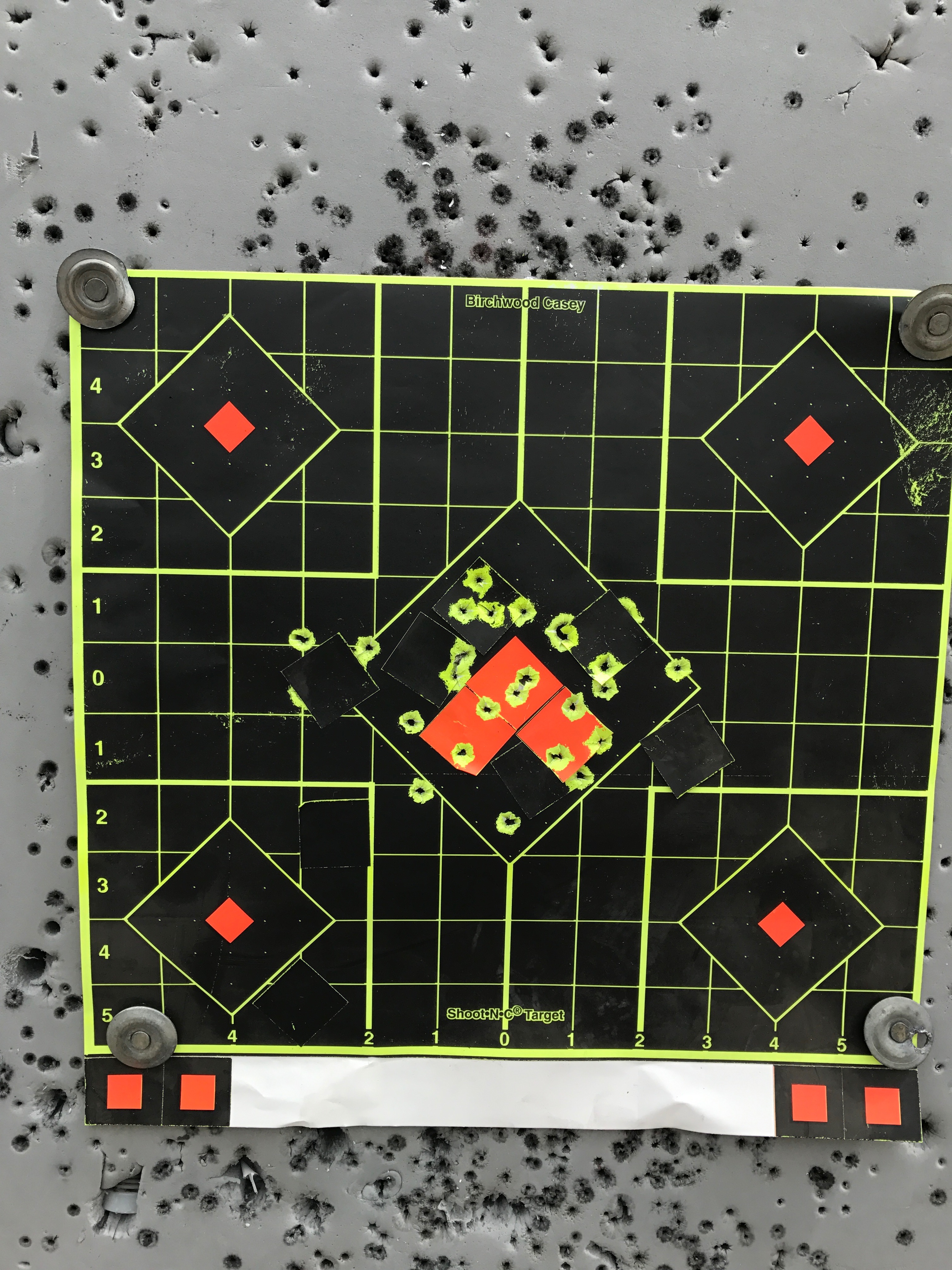 Marlin 795 (.22 semi-auto rifle) from 53 yards with Tech Sights (peep rear and post front).